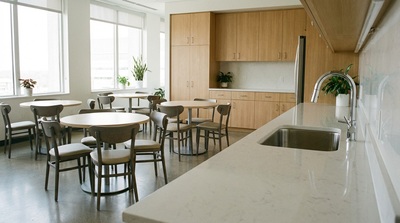 Clean and organized office breakroom kitchen.